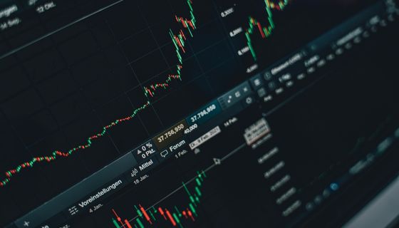 Financial growth charts on screen